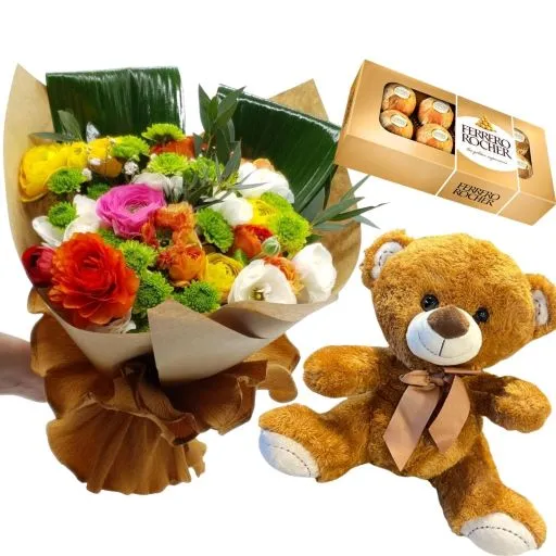 Ramo de flores marimonias con chocolate y peluche